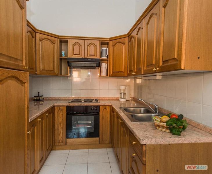 Apartmani Aria โรกอซนิซา ภายนอก รูปภาพ