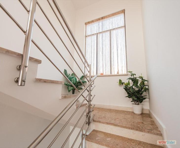 Apartmani Aria โรกอซนิซา ภายนอก รูปภาพ
