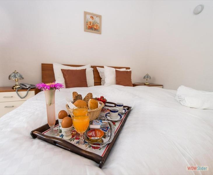 Apartmani Aria โรกอซนิซา ภายนอก รูปภาพ