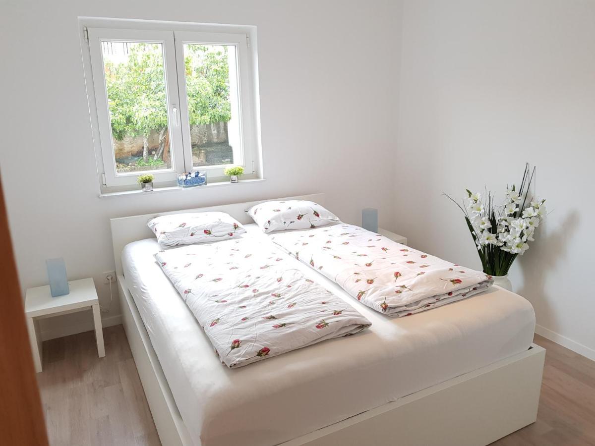 Apartmani Aria โรกอซนิซา ภายนอก รูปภาพ