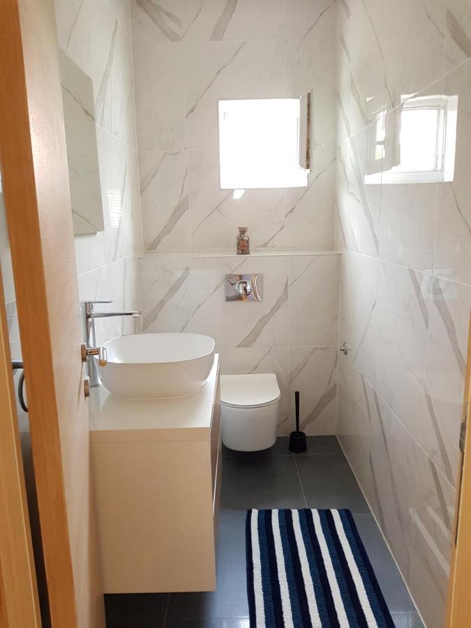 Apartmani Aria โรกอซนิซา ภายนอก รูปภาพ