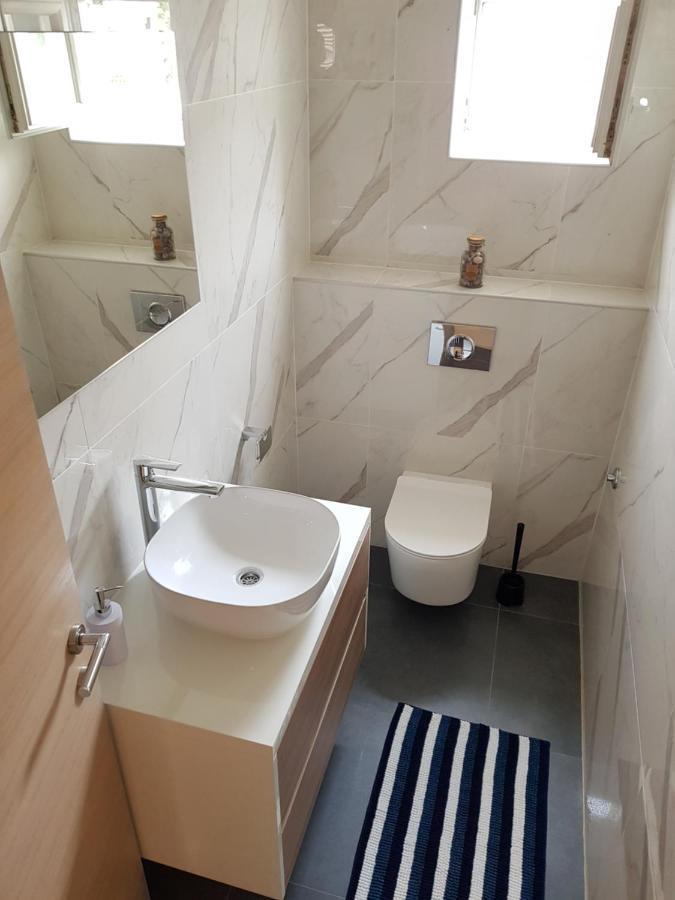 Apartmani Aria โรกอซนิซา ภายนอก รูปภาพ